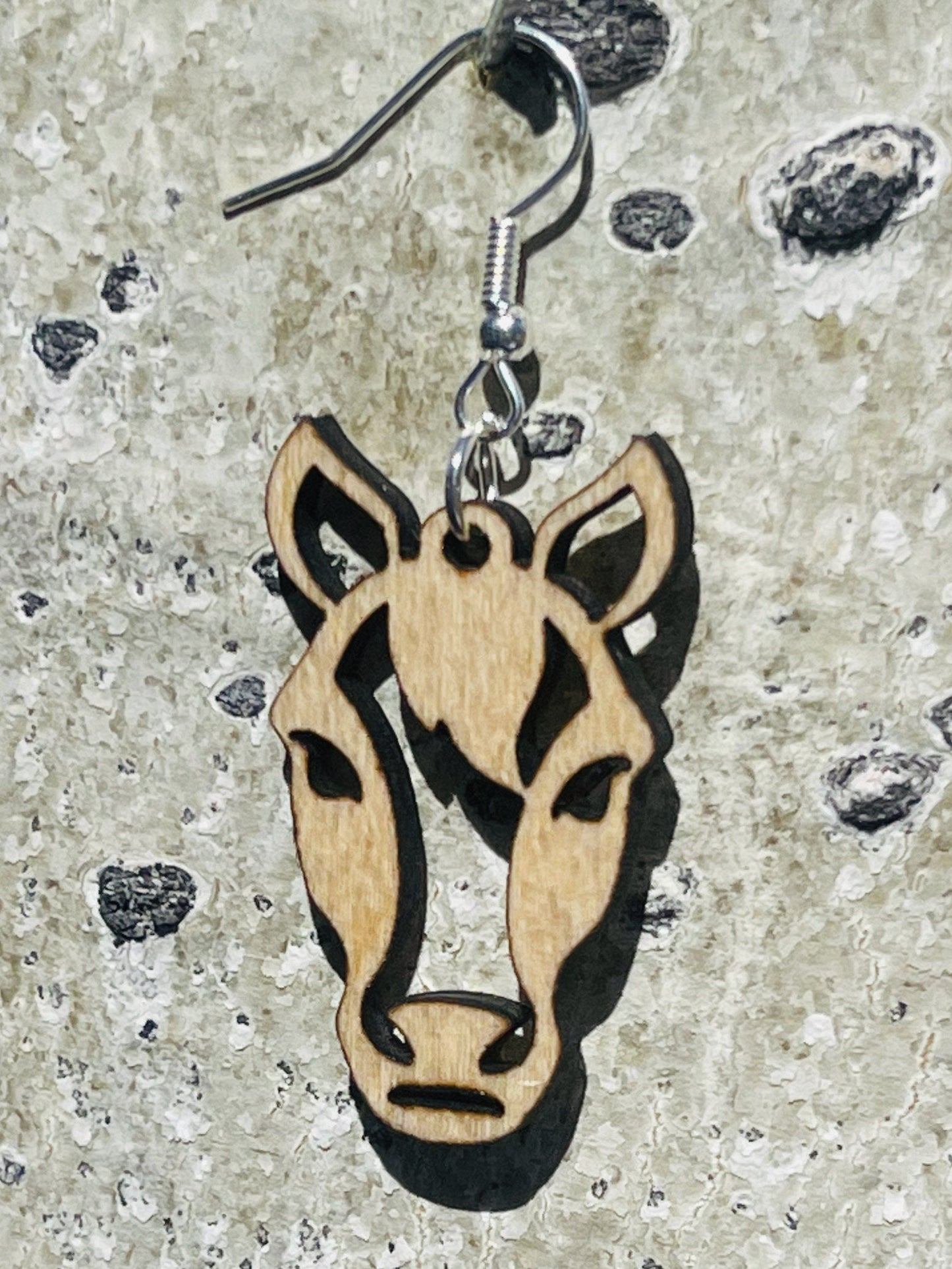 Horse dangle earring to show the love for horses. They are laser cut, lightweight birchwood dangle earring that can be worn easily all day. Great gift for mom or any horse lover.