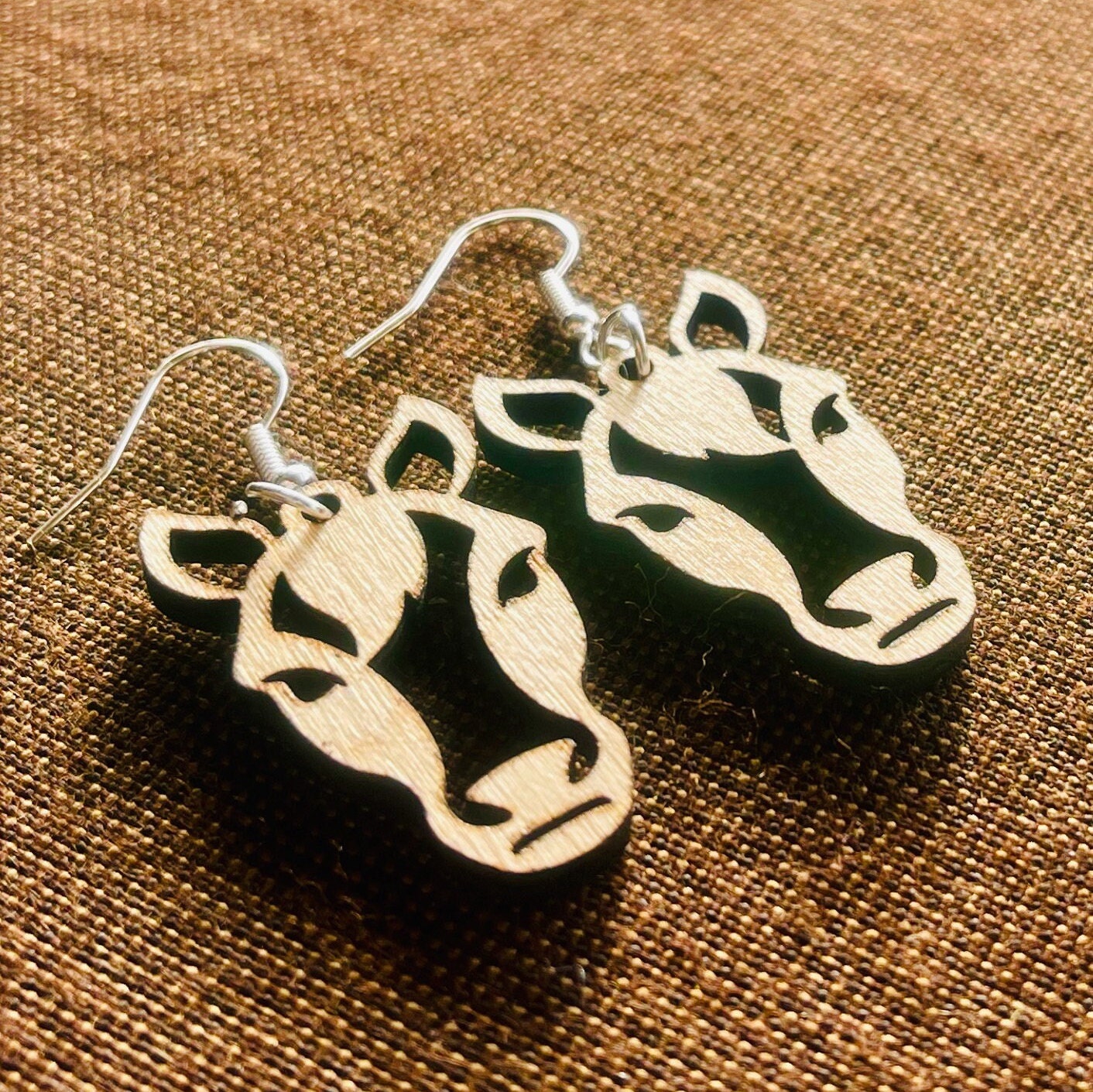 Horse dangle earring to show the love for horses. They are laser cut, lightweight birchwood dangle earring that can be worn easily all day. Great gift for mom or any horse lover.