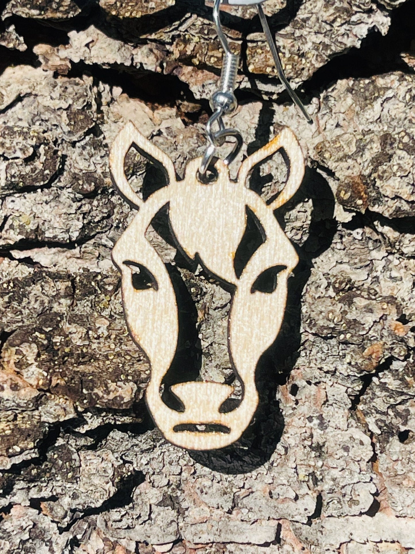 Horse dangle earring to show the love for horses. They are laser cut, lightweight birchwood dangle earring that can be worn easily all day. Great gift for mom or any horse lover.