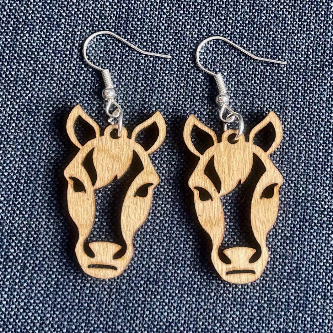 Horse dangle earring to show the love for horses. They are laser cut, lightweight birchwood dangle earring that can be worn easily all day. Great gift for mom or any horse lover.