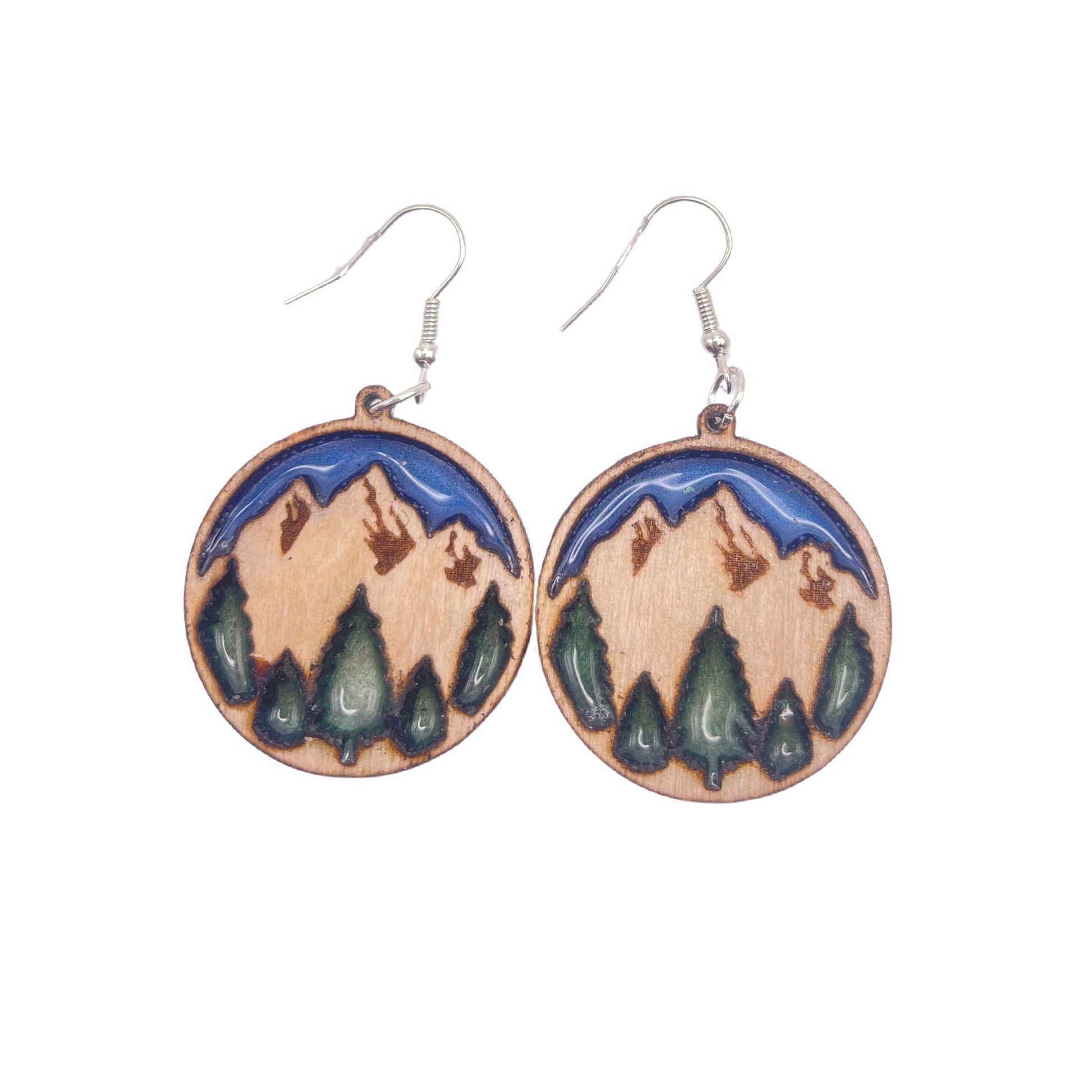 Beautiful mountain dangle earrings with twilight blue sky and enchanted forest green trees are lightweight, comfortable and easy to wear all day.