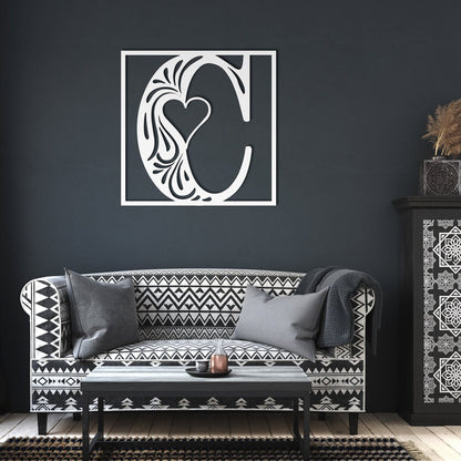 Stunning decorative square monogram metal wall art with a heart this stunning large metal letter wall art. This unique wall art is handcrafted from high-quality 18 gauge steel and powder coated in your choice of 5 colors in a range of sizes
