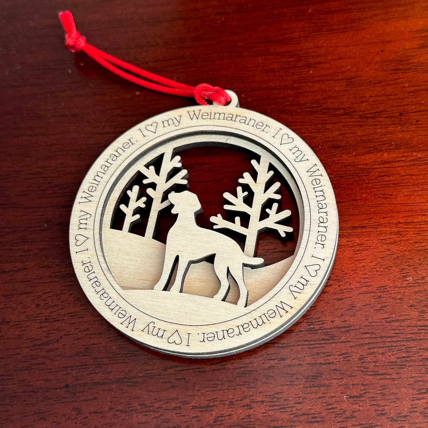 I love my Weimaraner ornament. This heartfelt dog ornament is a keepsake for celebrating a loving pet.  The ornament is a perfect gift for anyone who loves Weimaraner or is looking for a Weimaraner gift.