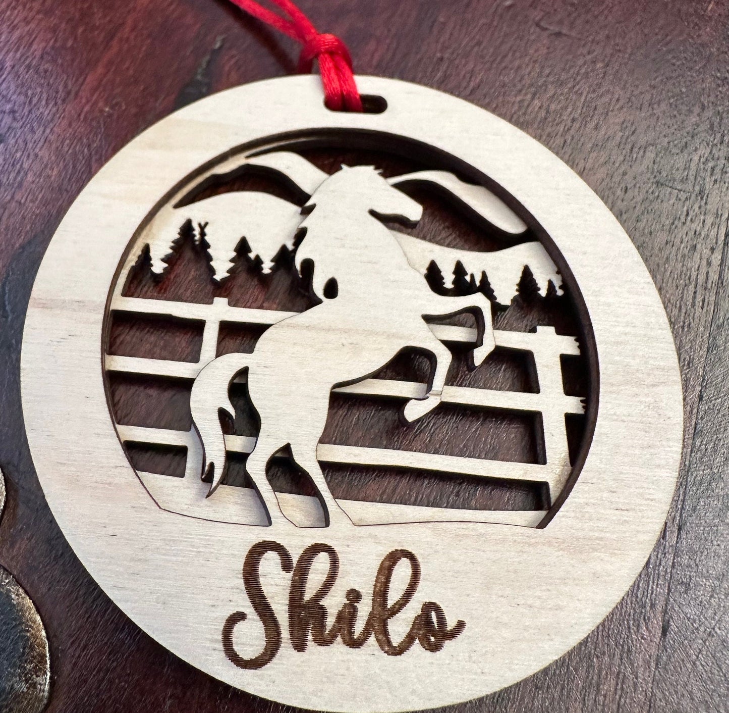 Beautiful personalized horse with a mountains ornament can be customized with your name, horse’s or text of your choosing. This keepsake equestrian ornament is a heartfelt memorial for the celebration of life and experiences.