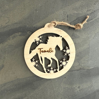 Beautiful personalized horse with snow ornament can be customized with your name, horse’s or text of your choosing. This keepsake equestrian ornament is a heartfelt memorial for the celebration of life and experiences.