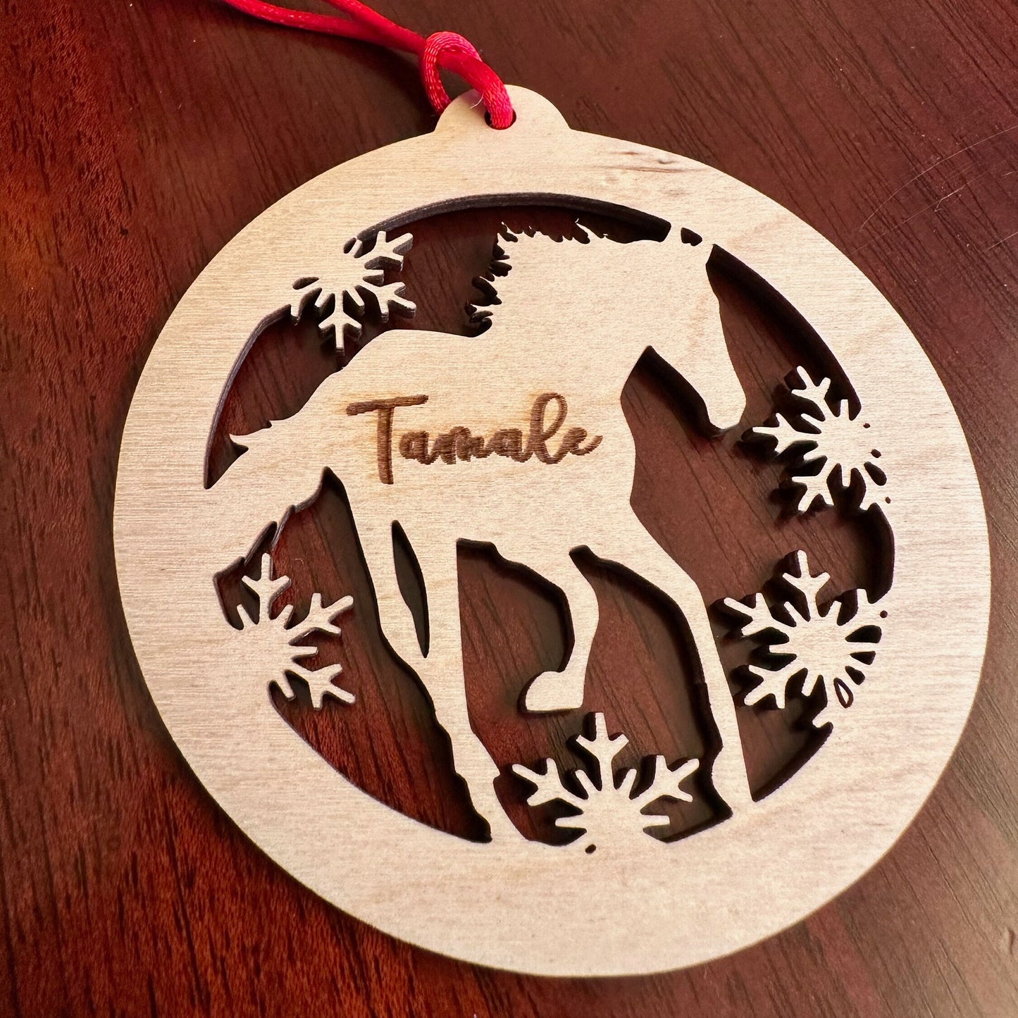 Beautiful personalized horse with snow ornament can be customized with your name, horse’s or text of your choosing. This keepsake equestrian ornament is a heartfelt memorial for the celebration of life and experiences.