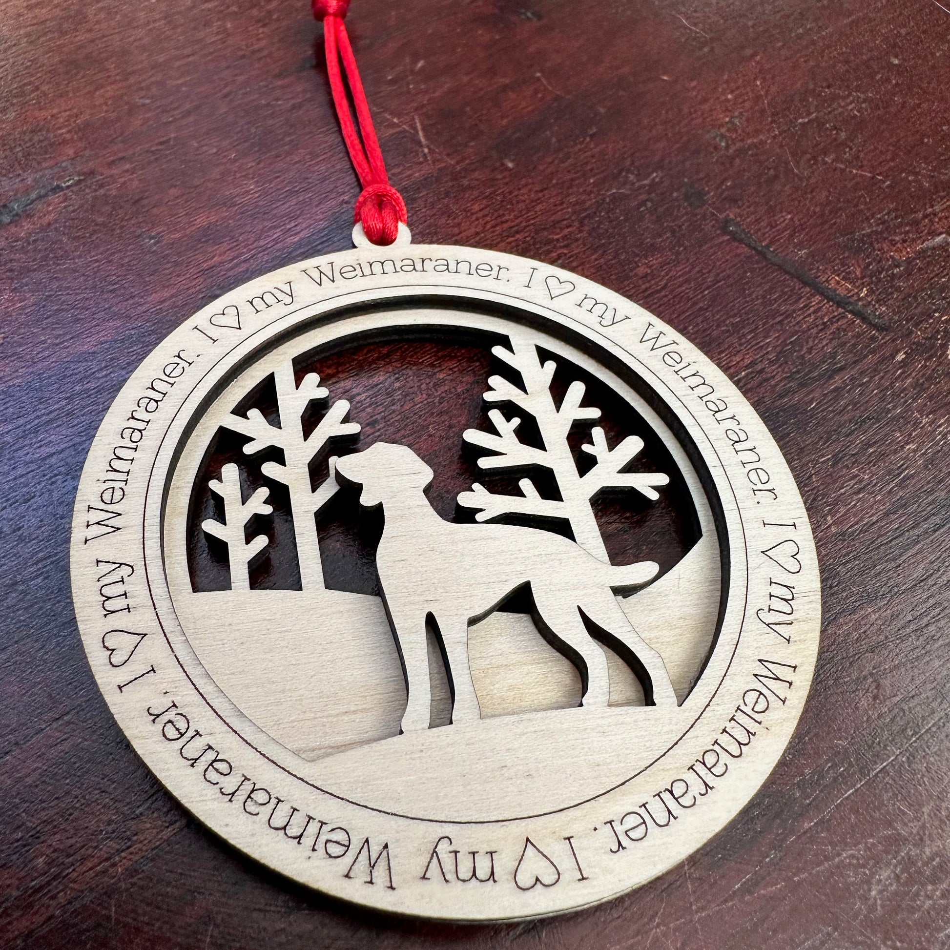 I love my Weimaraner ornament. This heartfelt dog ornament is a keepsake for celebrating a loving pet.  The ornament is a perfect gift for anyone who loves Weimaraner or is looking for a Weimaraner gift.