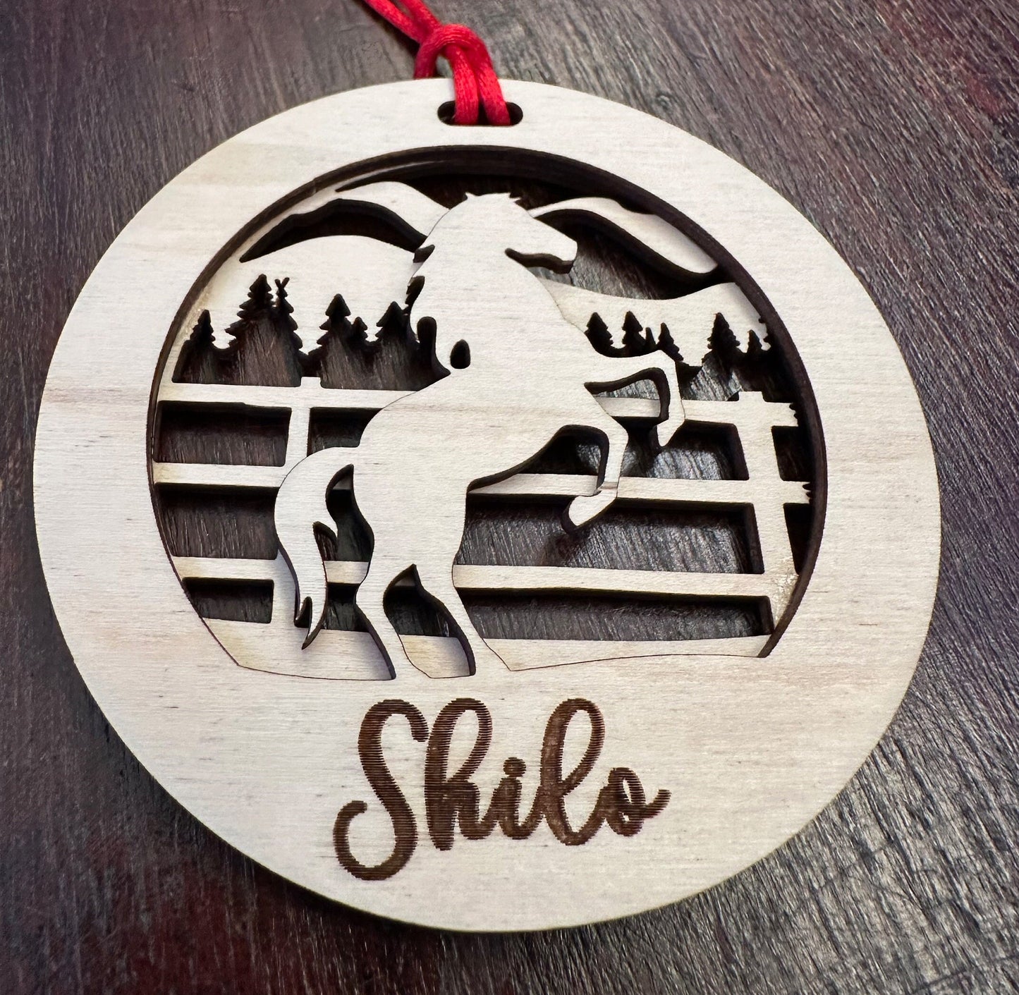 Beautiful personalized horse with a mountains ornament can be customized with your name, horse’s or text of your choosing. This keepsake equestrian ornament is a heartfelt memorial for the celebration of life and experiences.
