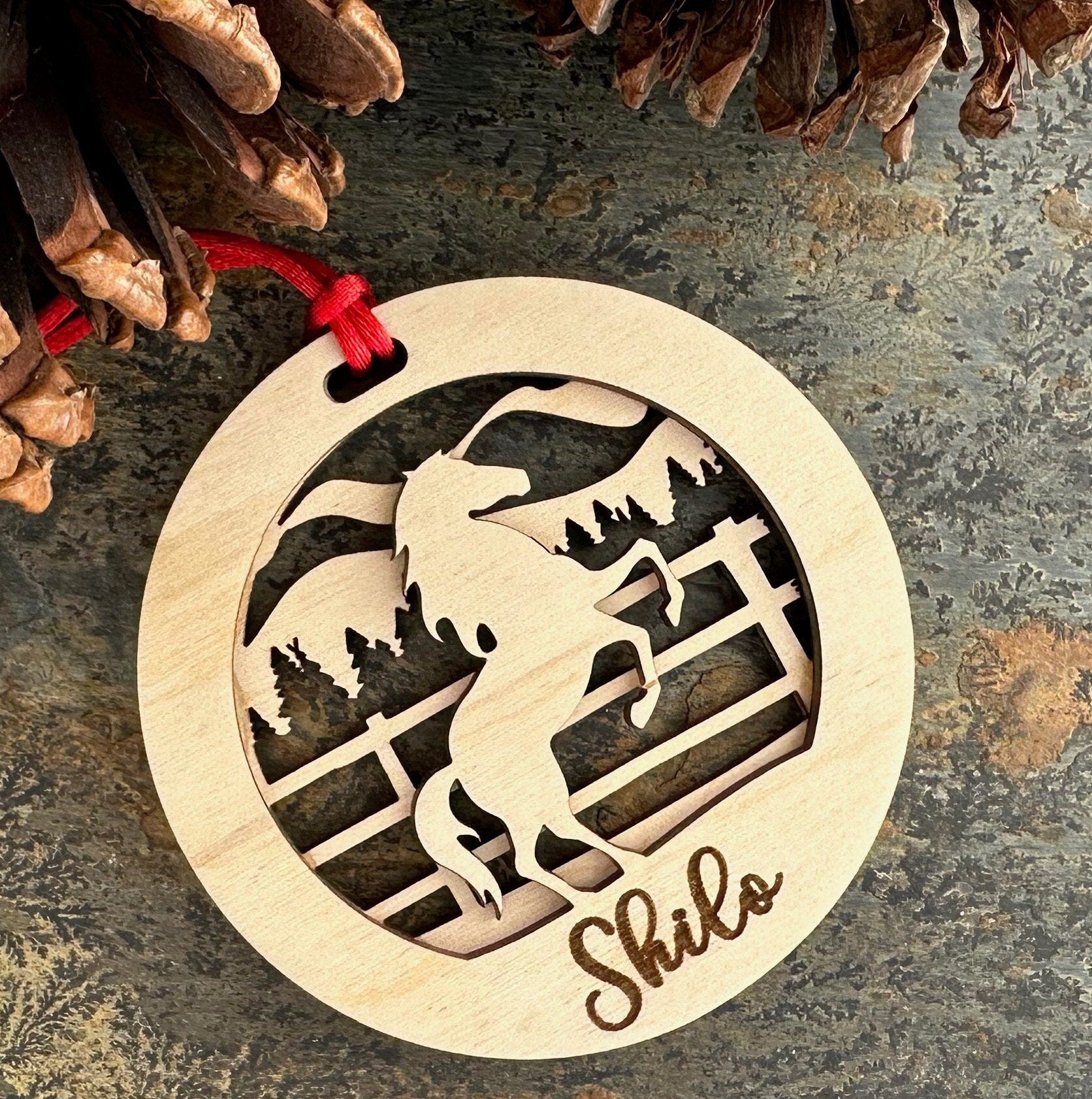 Beautiful personalized horse with a mountains ornament can be customized with your name, horse’s or text of your choosing. This keepsake equestrian ornament is a heartfelt memorial for the celebration of life and experiences.