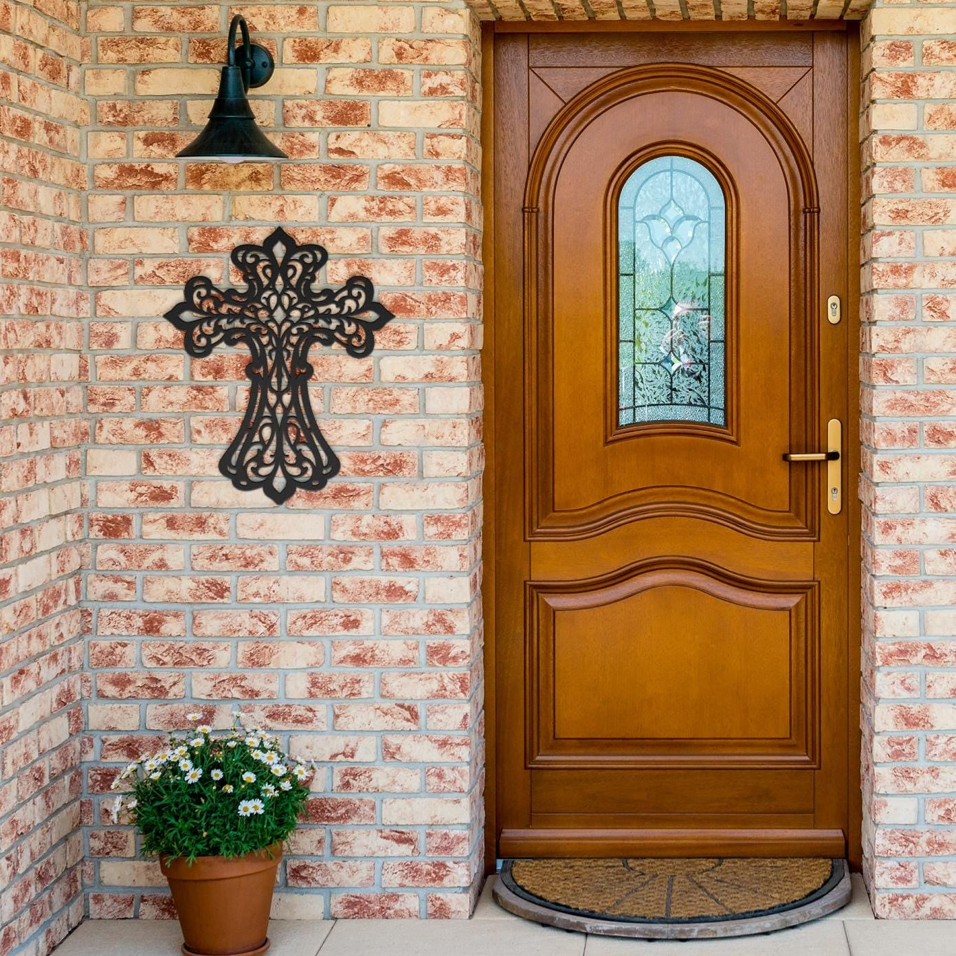 Decorative filigree metal cross wall art with ornate scrollwork, elegant Christian home decor and religious wall accent