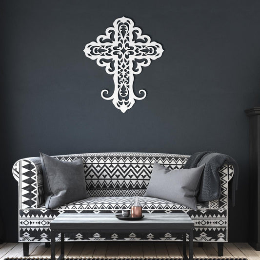 Decorative filigree metal cross wall art with ornate scrollwork, elegant Christian home decor and religious wall accent